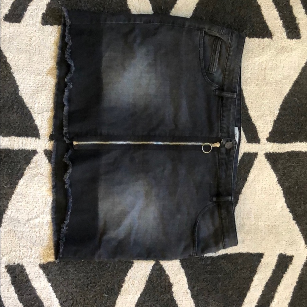 black mini skirt with zipper up the front
